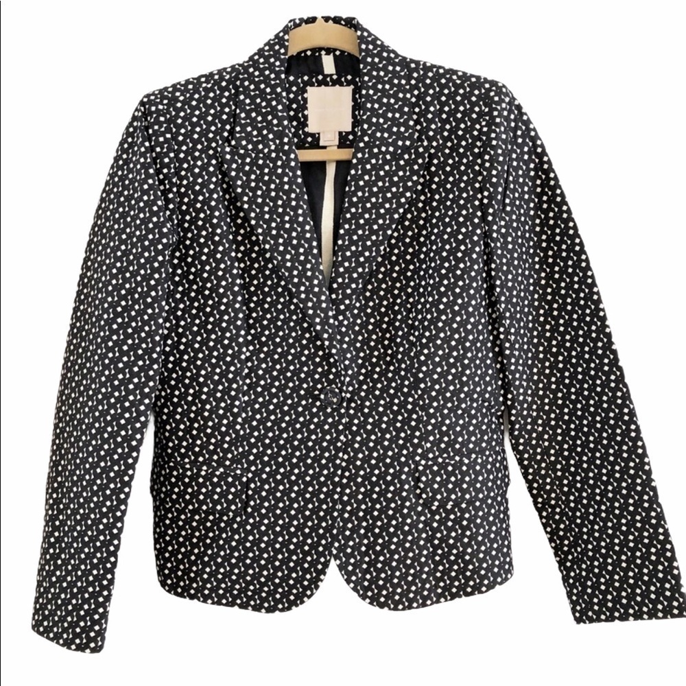Magashoni black and white patterned blazer.